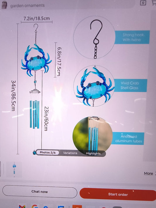 blue crab-themed wind chime featuring a vibrant blue crab at the top and silver-